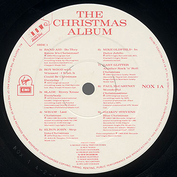 NOW — THE CHRISTMAS ALBUM LP by Various Artists (EMI/Virgin NOX 1) – label, side 1
